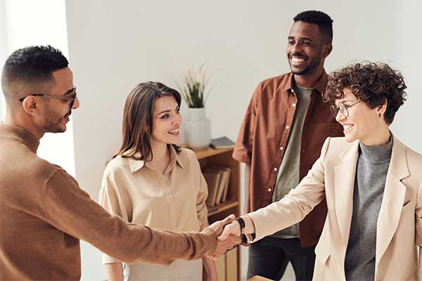 four members talking about bussiness